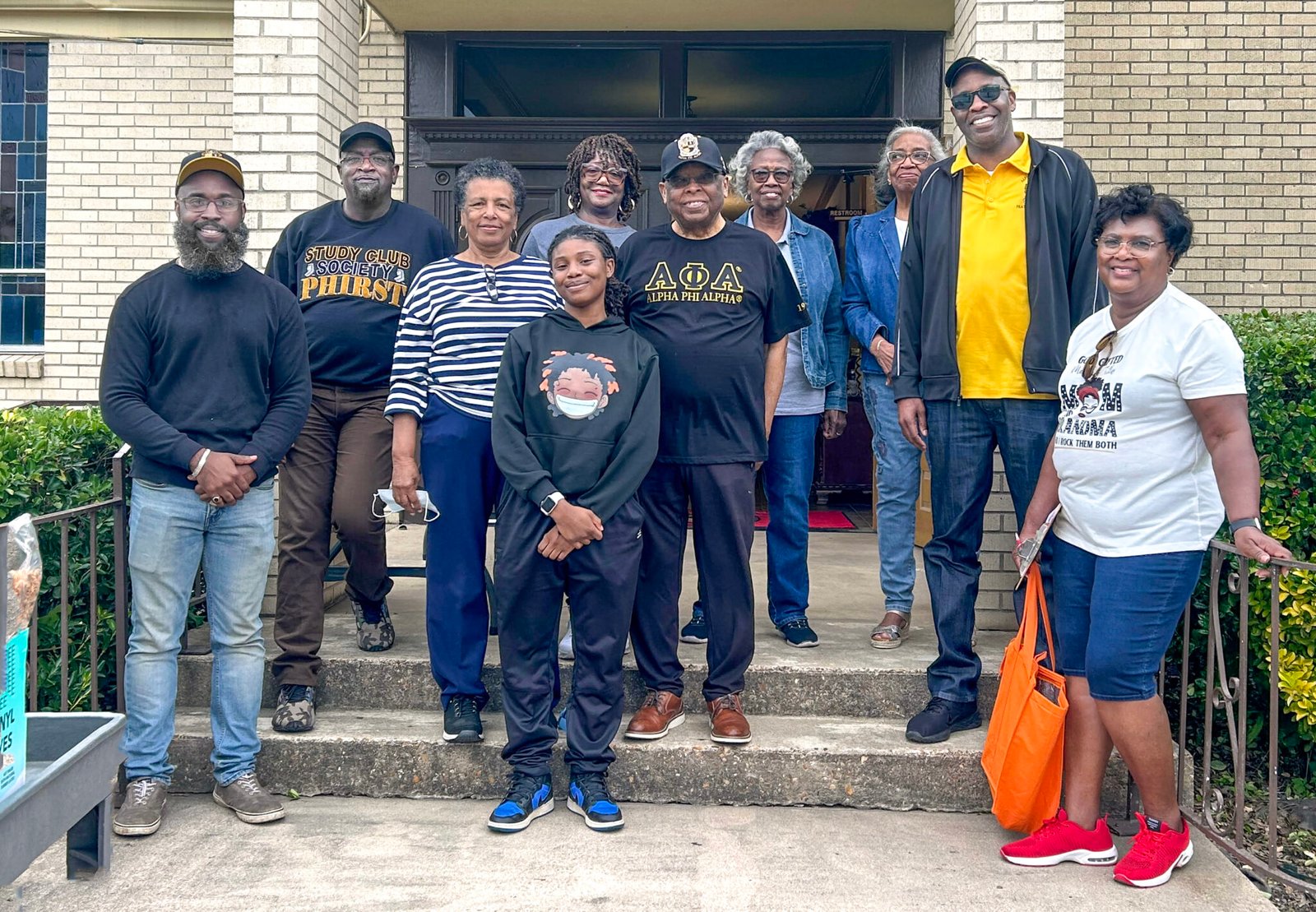 DSL Brothers helping at the St. John's AME Food Pantry give away