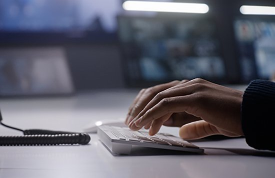 African American man operating keyboard
